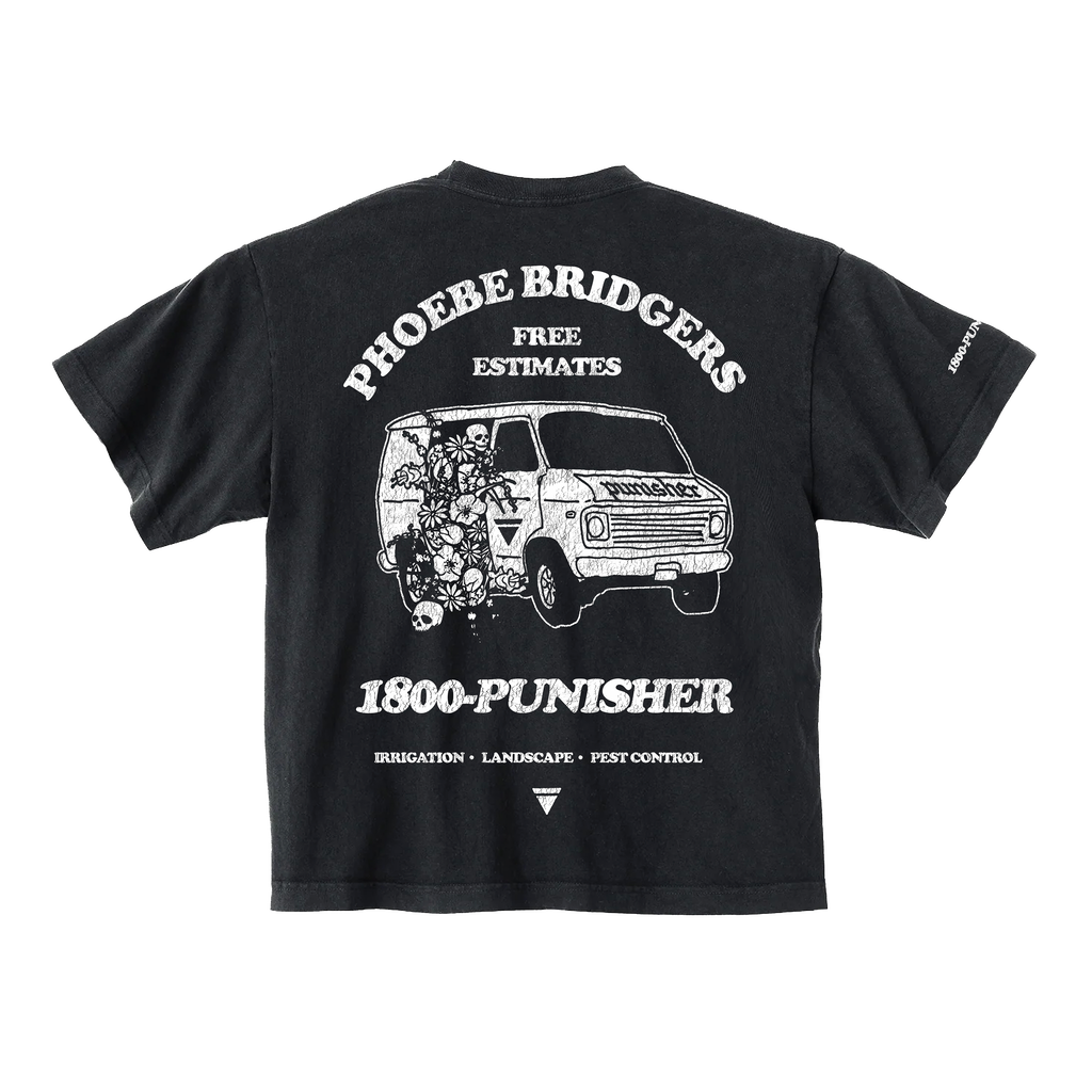 The back of a Black t-shirt with white graphic design of a van with flowers pouring out and Phoebe Bridgers, free estimates, and 1800-Punisher in white text.  